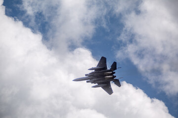F15 fighter jet taking off with landing gear up, Captured from a public road 