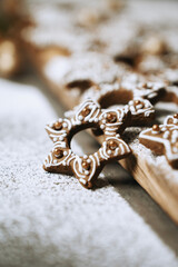 hand-decorated christmas cookies on a wooden background
