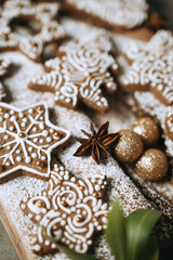 hand-decorated christmas cookies on a wooden background