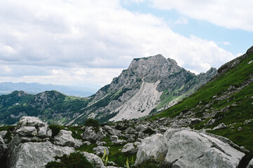 Panoramic Mountain Range and Views - Alpine style Alps in Durmitor, Montenegro - Wide Landscape Shot of epic Mountains and Roads