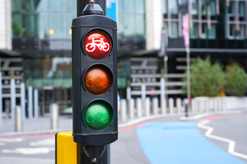 Red cycle traffic light in the city