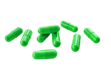 Green medicine capsules and remedy pills, pharmaceutical cure, antibiotics or painkillers isolated on transparent background