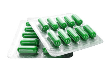 Green medicine capsules and remedy pills in blister pack, pharmaceutical cure, antibiotics or painkillers isolated on transparent background