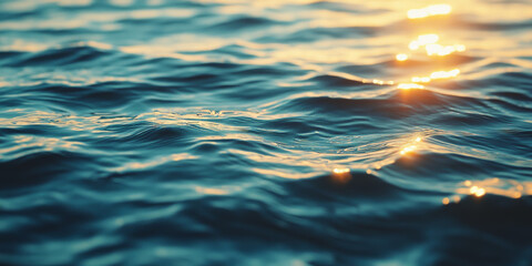 A serene scene of gentle ocean waves with golden sunlight reflecting off the water, creating a peaceful and tranquil mood.

