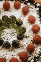 cake with blueerries and raspberries on wooden background