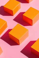 Obraz premium Orange Boxes on Pink Surface