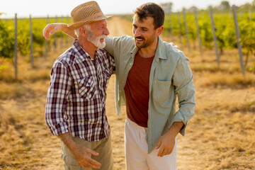 Joyful day spent in the vineyard, where generations connect through laughter and shared moments under the warm sun