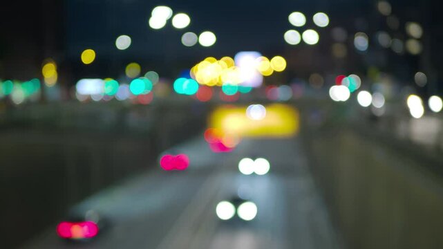 Defocussed night-time traffic.
Out-of-focus UK traffic on the Birmingham inner ring road. Loops. 