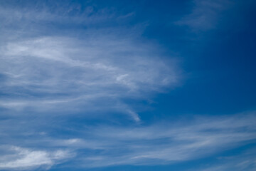 Blue sky cirrus clouds.