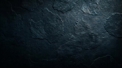 Naklejka premium Dark, textured stone background with a rough surface.