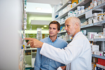 Pharmacy, advice and consulting with people in store for medicine, pills and healthcare. Medical, insurance and antibiotic prescription with pharmacist in clinic for help, drugstore and dispensary