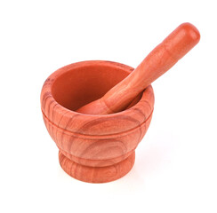 Wooden pattern mortar with pestle on white background.