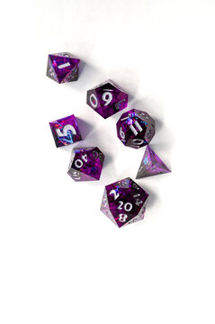 Set of purple dice for rpg, dnd or board games on a light background. polyhedral dice (d4, d6, d8, d10, d12 and d20) for fantasy games