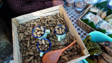 boiled peanuts in wooden basket