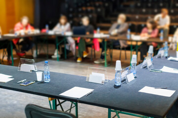 Empty conference table with paper and pen