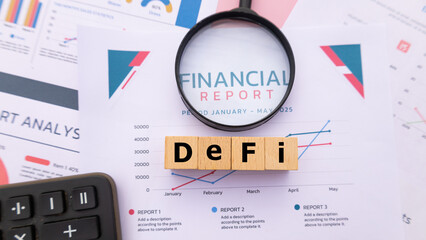 Wooden cube with the word DEFI. It is an abbreviation of Decentralized Finance . Business...