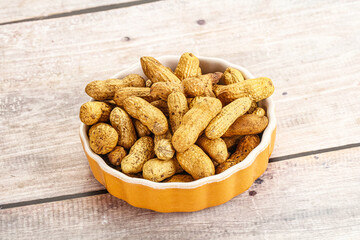 Raw ripe unpeeled peanut heap