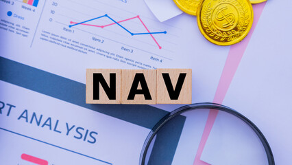 Wooden cube with the word NAV. It is an abbreviation of Net Asset Value. Business profitability...