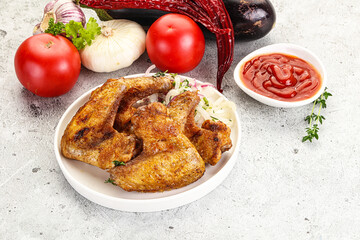 Grilled chicken wings with sauce