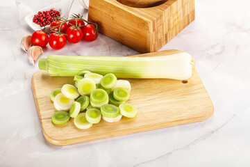 Ripe sliced leek over board
