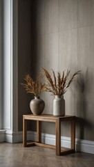 Plain wall in an empty room with a wooden side table and vases.
