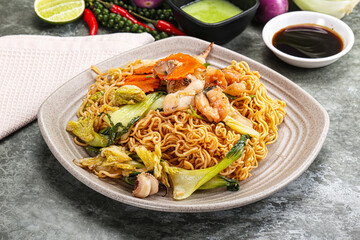Asian cuisine - Fried noodles with seafood