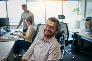 Office, portrait and man with sticky note, forehead and sign for happiness, corporate and...