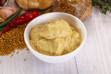 Dijon mustard sauce in the bowl