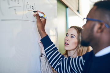 University, whiteboard and teacher with student writing for math lesson, learning and examination....