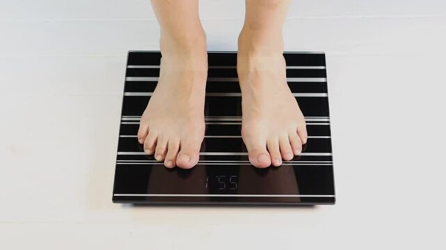 Close up, weighing on electronic home scales.