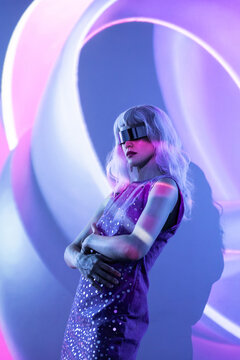 Futuristic woman exploring virtual worlds in metaverse setting