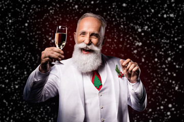 Photo of mature man happy positive smile drink champagne party x-mas holiday isolated over dark color background