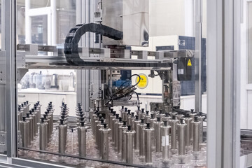 Close up view of a high technology automation machine in a factory, or testing center, or research and development laboratory.