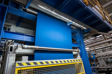 Fabric batching process machine industrial plant line in a textile factory.