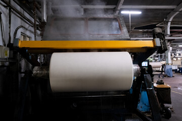 Fabric batching process machine industrial plant line in a textile factory.