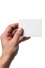 Fototapeta premium A person holding a white business card with company details