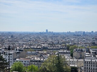 PARIS, FRANCE - April 13, 2024: Paris aerial panorama view from the steps of Sacre Coeur church at the top of Monmatre