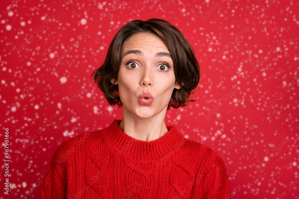 Sticker Photo portrait young woman staring amazed in sweater isolated bright red color background