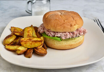 spam salad sandwich with potato wedges