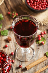 A cup of medicinal wine made of fresh hawthorn berries and spices