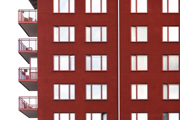 Red modern apartment building in Stockholm, Sweden.