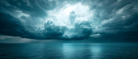 Fototapeta premium Intense dramatic storm clouds gathering over a moody turbulent ocean landscape A photography concept with ample copy space for text overlay or additional design elements