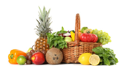 Different fresh fruits and vegetables in wicker basket isolated on white
