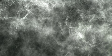 Obraz premium Delicate tendrils of smoke intertwine in shades of gray, creating an ethereal atmosphere with dynamic movement and depth