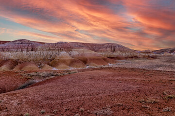 Akzhar chalk mountains in the desert of Kazakhstan. Rare sandy hills with many multi-colored layers of clay, sand, chalk and gravel of bizarre shape far from civilization with sparse vegetation