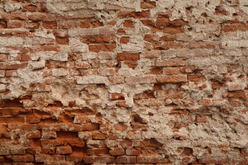 The bricks are reddish-brown with varying shades, indicating aging 
