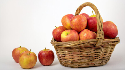 Basket of Red Apples with White Background and Copy Space