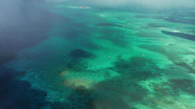 Aerial view of Alacranes Reef with turquoise water and pristine beach, Progreso, Mexico.