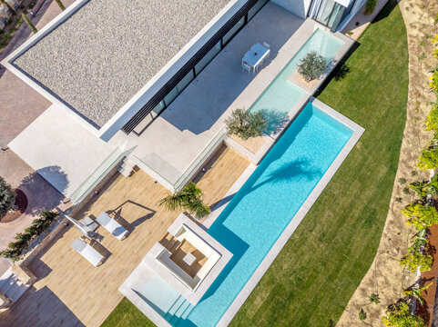 Aerial view of a luxury Mediterranean villa with a pool
