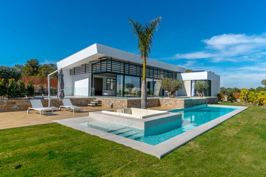 Modern Mediterranean villa with stylish pool and garden
